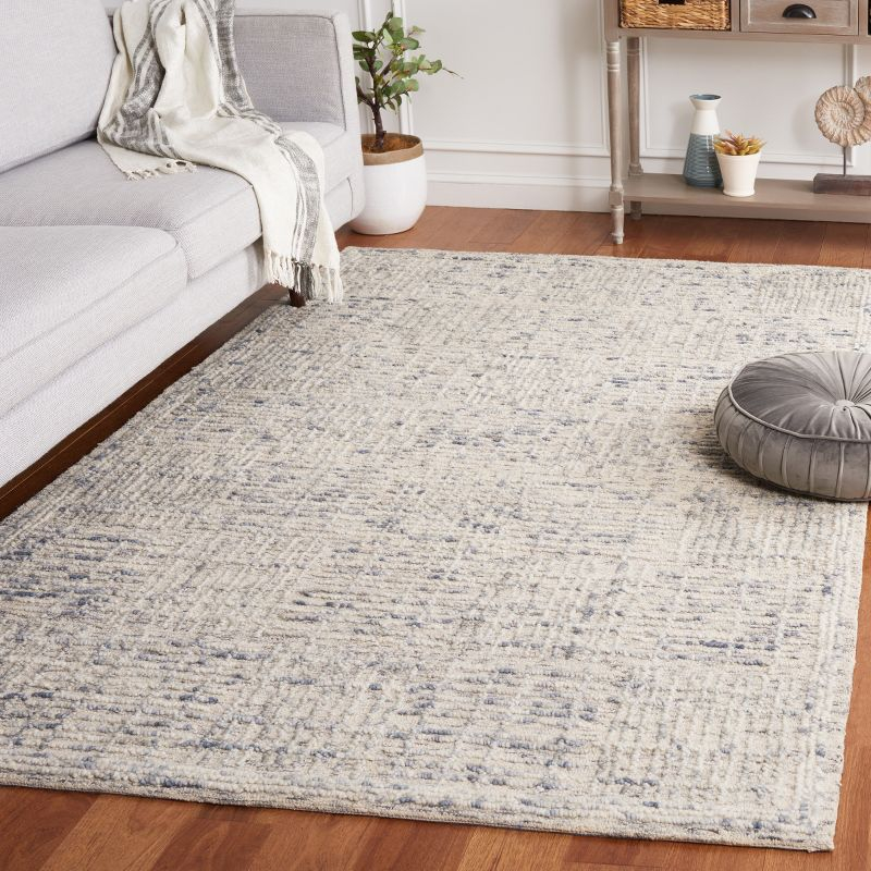 Abstract ABT275 Handmade Tufted Area Rug - Light Blue/Ivory - 5'-0" x 8'-0" - Safavieh