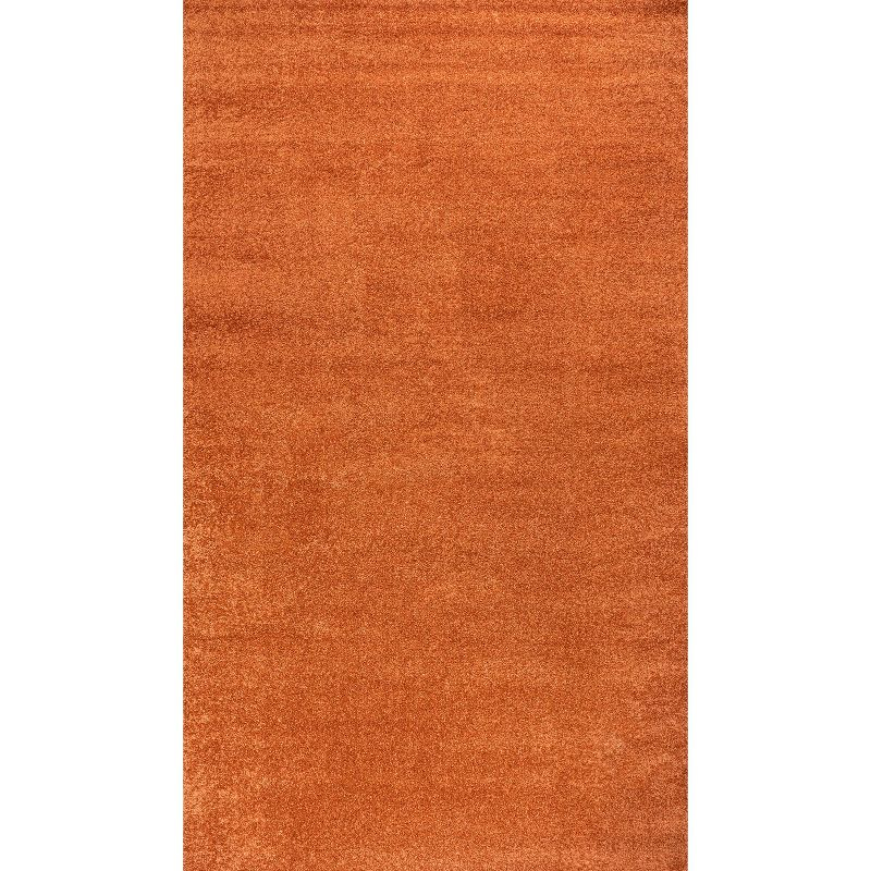 8'x10' Haze Solid Low-Pile Area Rug, Orange - JONATHAN Y