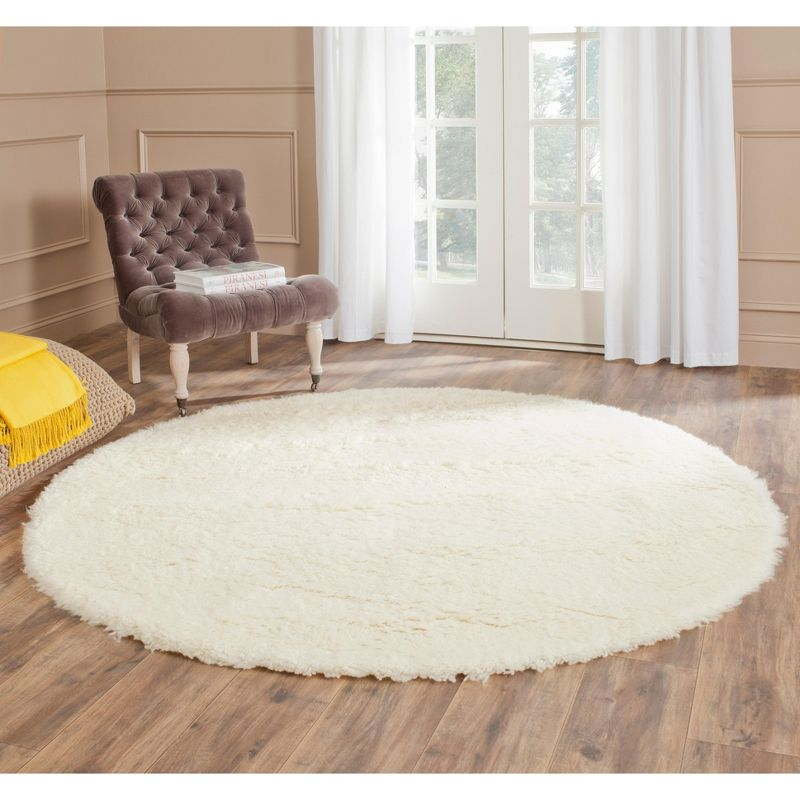 Flokati FLK150 Hand Tufted Round Area Rug - Ivory - 6' Round Safavieh.