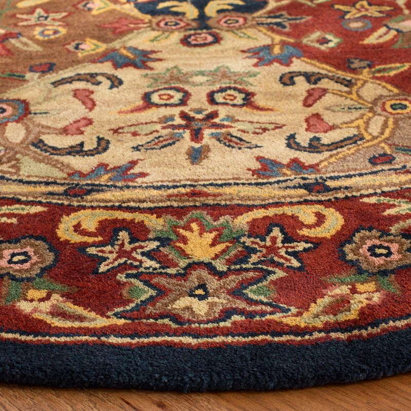 Heritage HG911 Hand Tufted Area Rug - Multi/Burgundy - 4'6"x6'6" Oval - Safavieh.