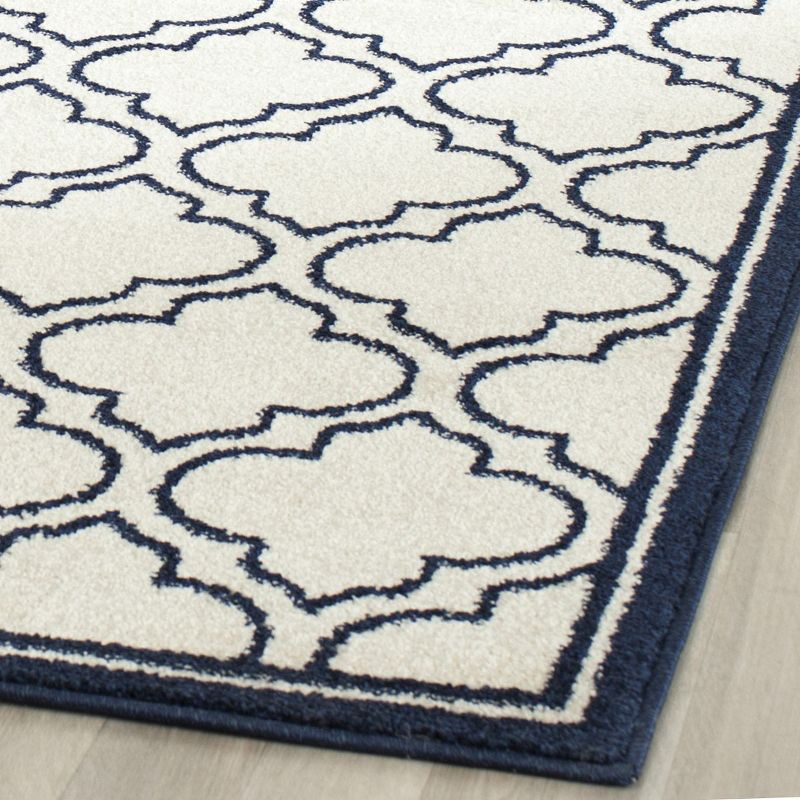 Amherst AMT412 Power Loomed Area Rug - Ivory/Navy - 8'x10' - Safavieh.