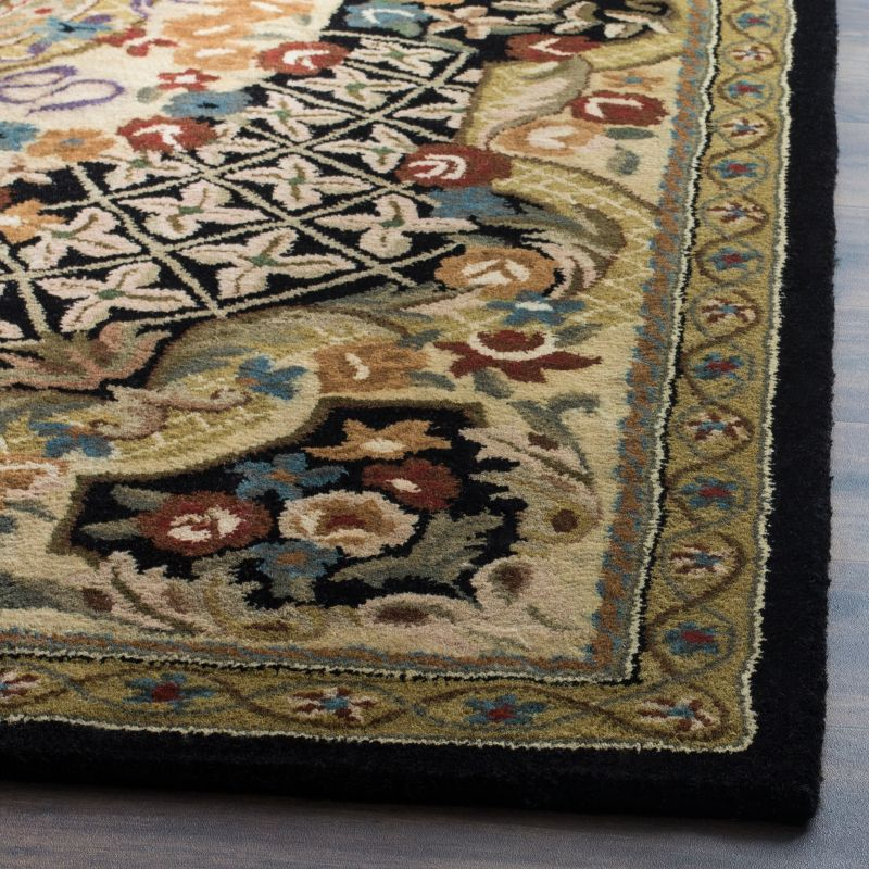 Classic CL304 Hand Tufted Area Rug - Black/Gold - 7'6"x9'6" - Safavieh.