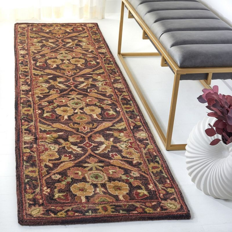 Antiquity AT51 Hand Tufted Indoor Accent Rug - Dark Plum/Gold - 2'3"x4' - Safavieh