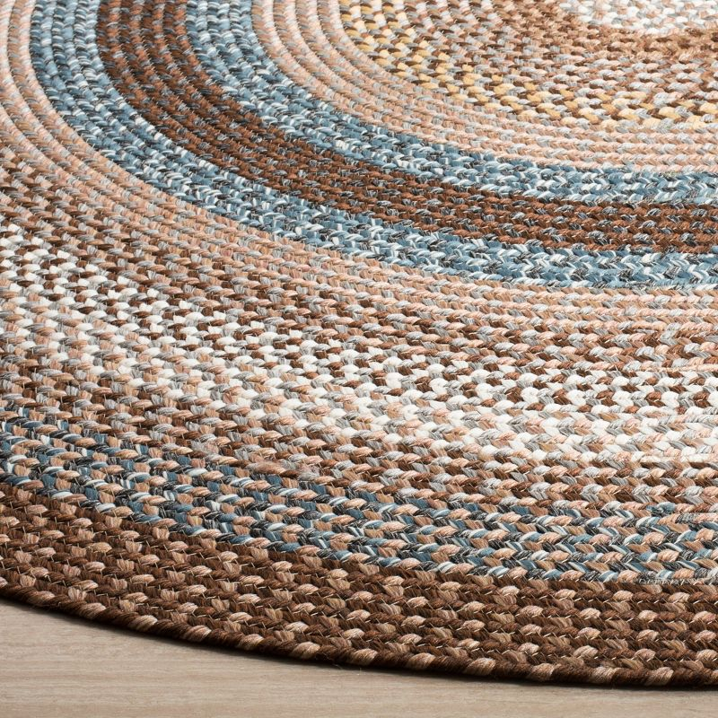 Braided BRD313 Hand Woven Area Rug - Brown/Multi - 6'x9' Oval - Safavieh.