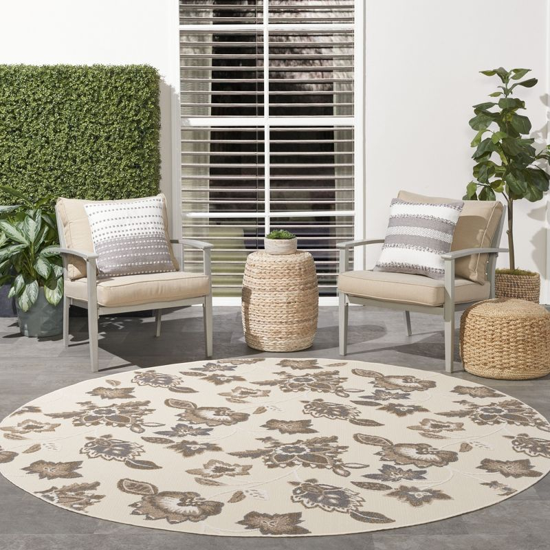 Nourison Aloha Floral Farmhouse Flatweave High-Low Indoor Outdoor Round Rug Beige 7’10” x 7'10"