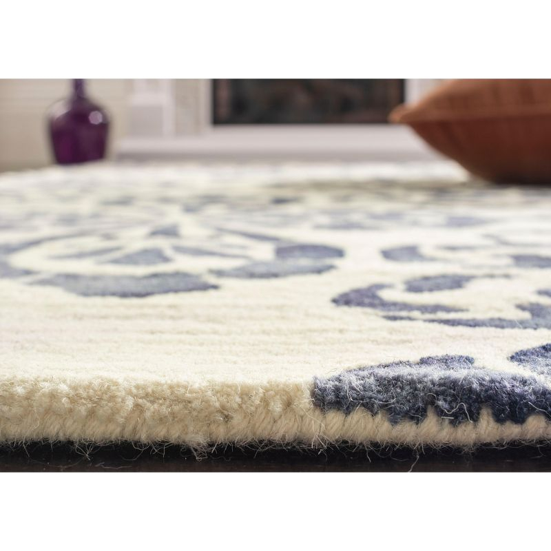Dip Dye DDY719 Hand Tufted Area Rug - Ivory/Navy - 8'x10' - Safavieh.