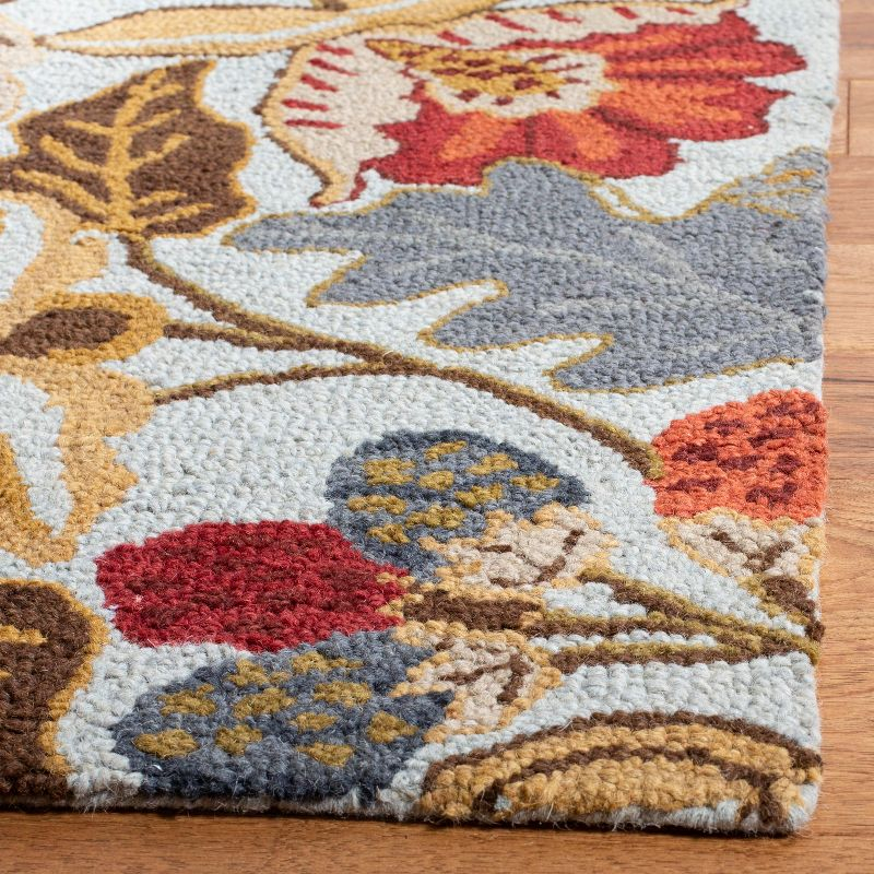 Blossom BLM863 Hand Hooked Runner Rug - Blue/Multi - 2'3"x10' - Safavieh.