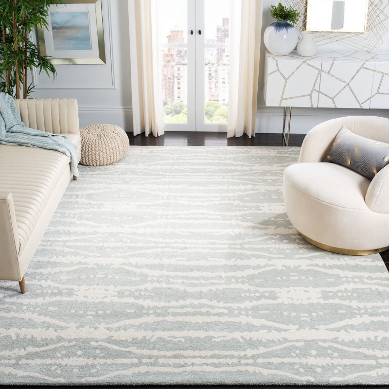 Soho SOH656 Hand Tufted Area Rug - Light Grey/Ivory - 7'6"x9'6" - Safavieh.