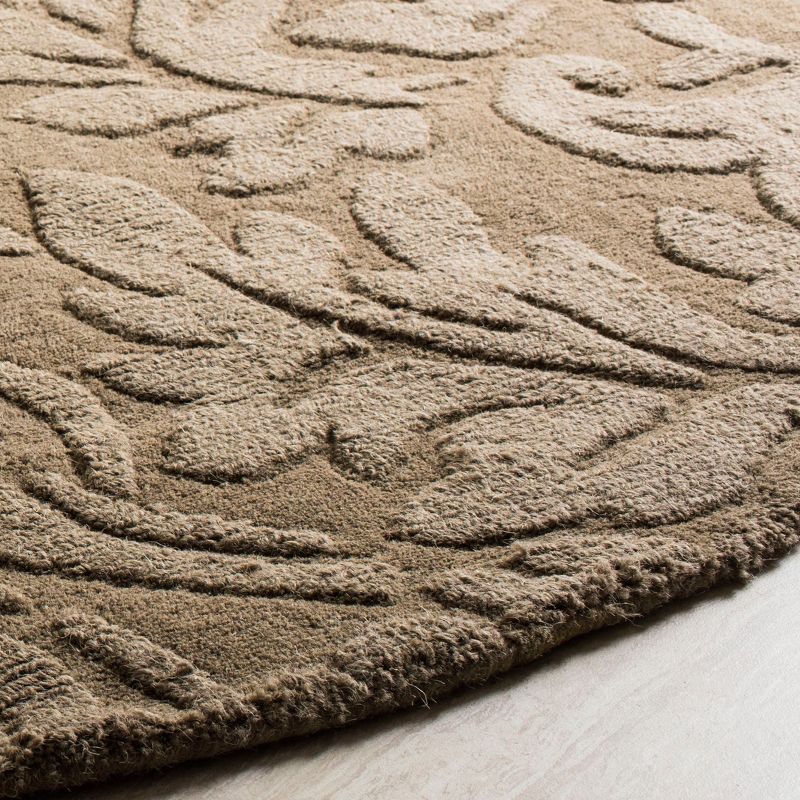 Impressions IM344 Hand Loomed Area Rug - Brown - 5' round - Safavieh.