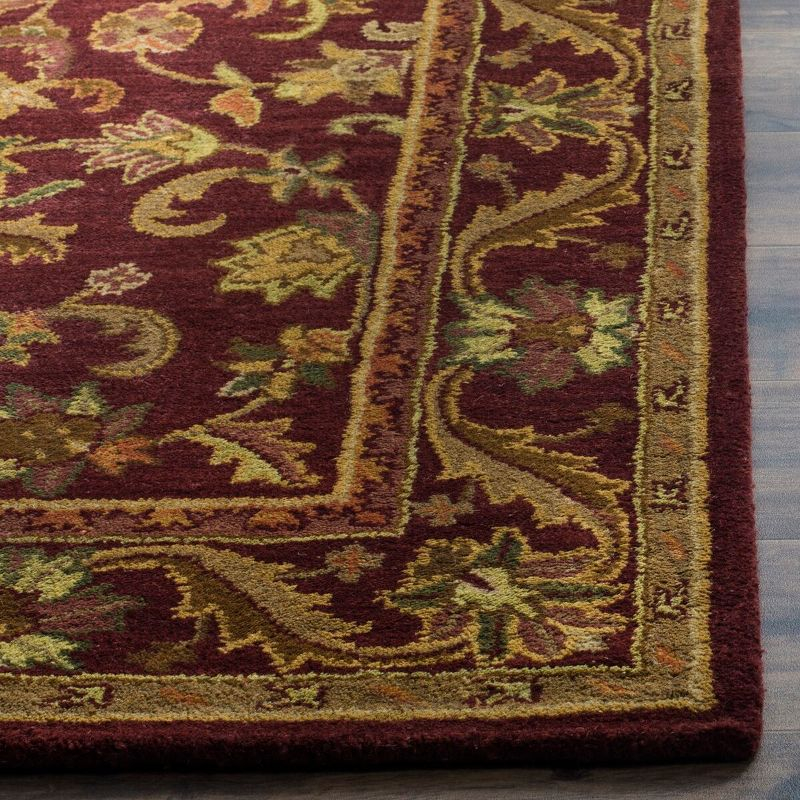 Antiquity AT52 Hand Tufted Indoor Area Rug - Wine/Gold - 7'6"x9'6" - Safavieh