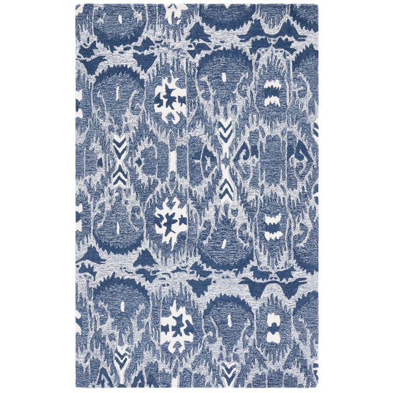Ikat IKT654 Hand Tufted Area Rug - Blue/Ivory - 8'x10' - Safavieh.