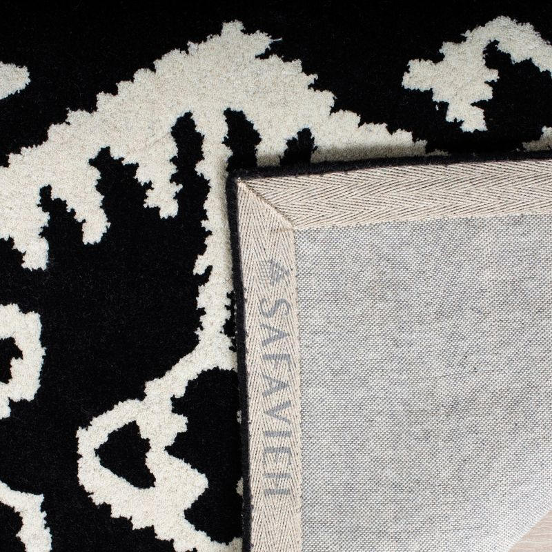 Wyndham WYD323 Hand Tufted Indoor Accent Rug - Black/Ivory - 2'6"x4' - Safavieh.