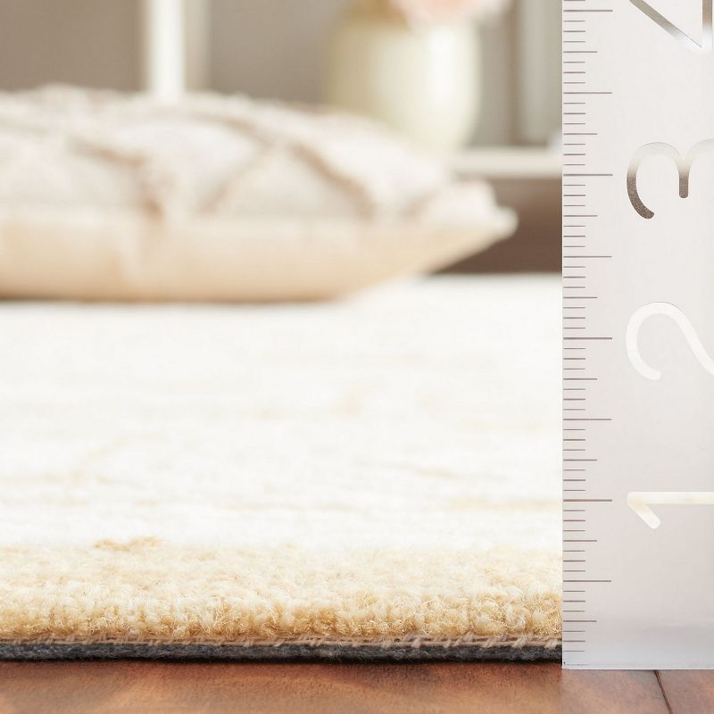 Ebony EBN310 Hand Tufted Indoor Area Rug - Ivory/Gold - 5'x8' - Safavieh