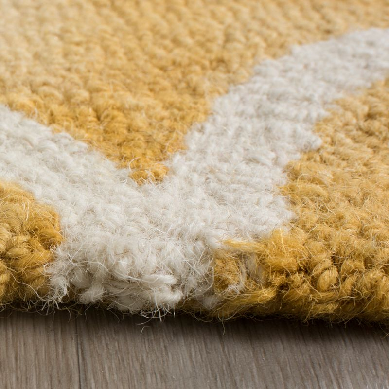 Dip Dye DDY535 Hand Tufted Area Rug - Gold/Ivory - 7' round - Safavieh.