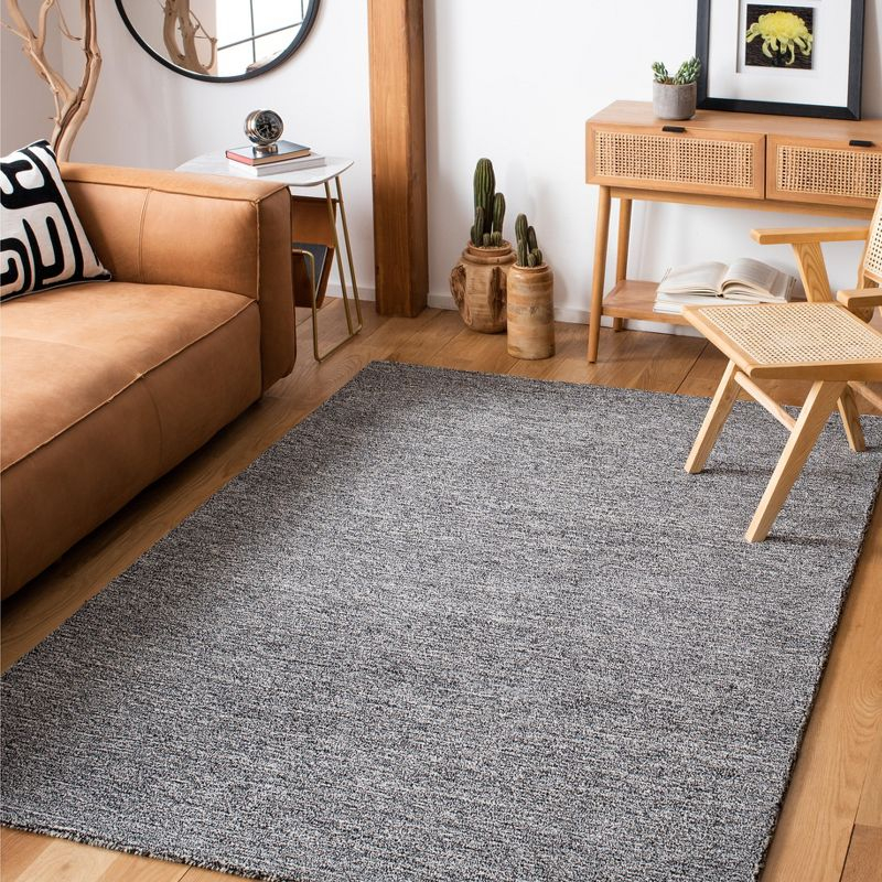 Metro MET867 Hand Tufted Indoor Area Rug - Black/Ivory - 4'x6' - Safavieh