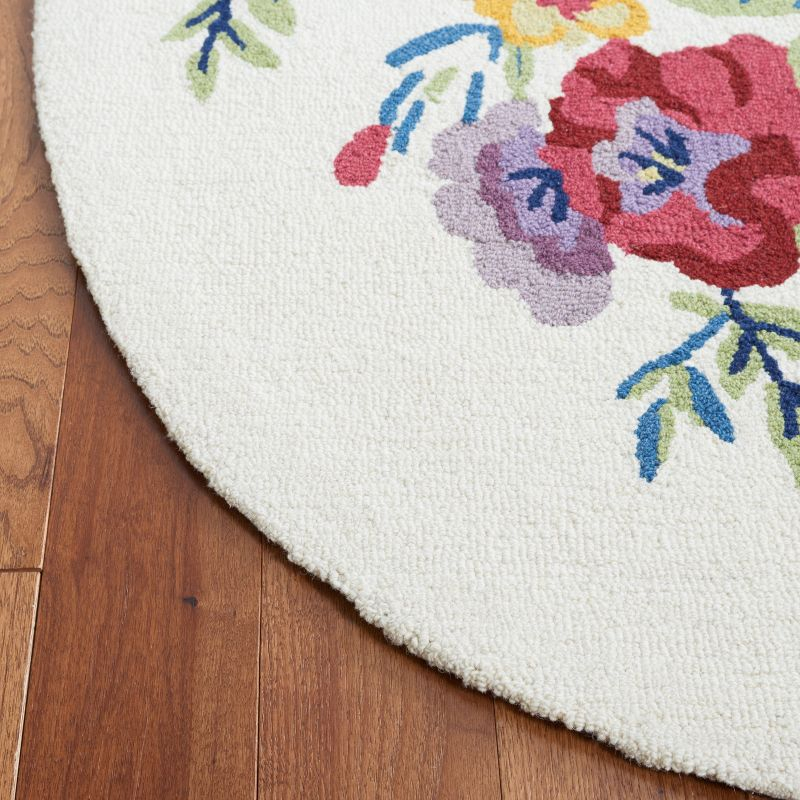 Chelsea HK219 Hand Tufted Area Rug - Ivory/Rose - 3'x5' Oval - Safavieh.