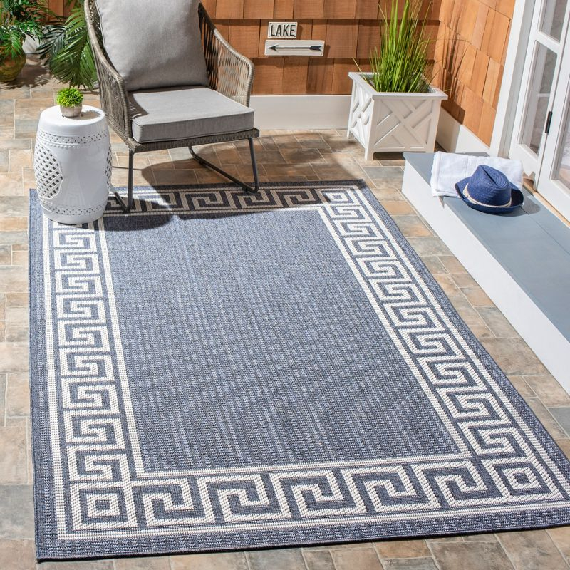 Bermuda BMU820 Power Loomed Indoor/Outdoor Area Rug - Dark Blue/Ivory - 6'7"x9'2" - Safavieh.
