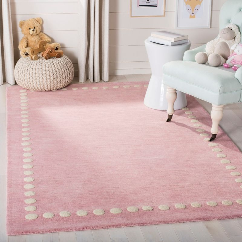Safavieh Kids SFK802 Hand Loomed Indoor Area Rug - Pink - 5'x8' - Safavieh