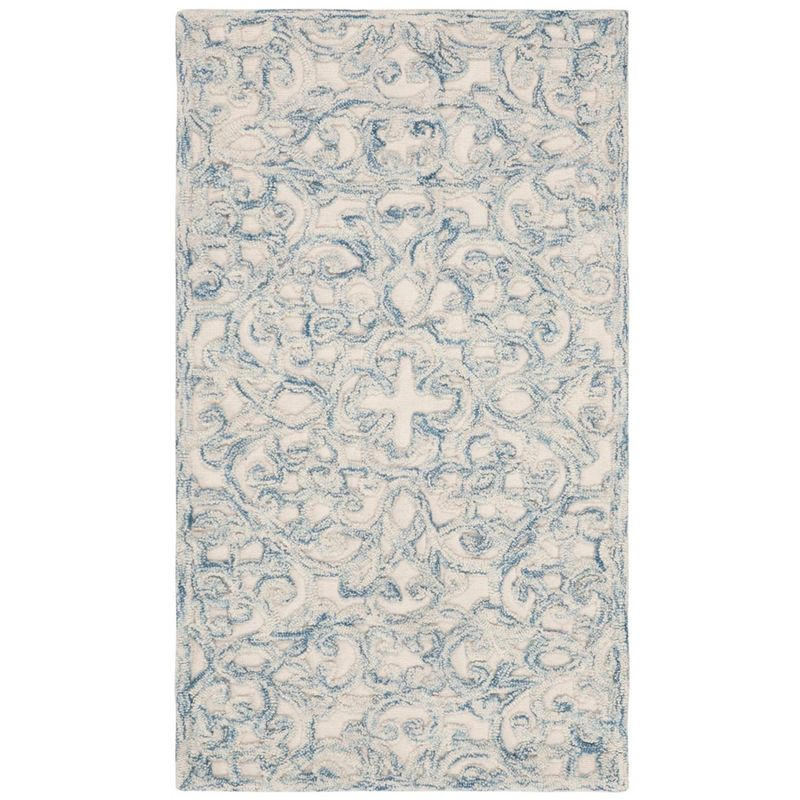 Trace TRC103 Hand Tufted Indoor Accent Rug - Blue/Ivory - 2'3"x4' - Safavieh.