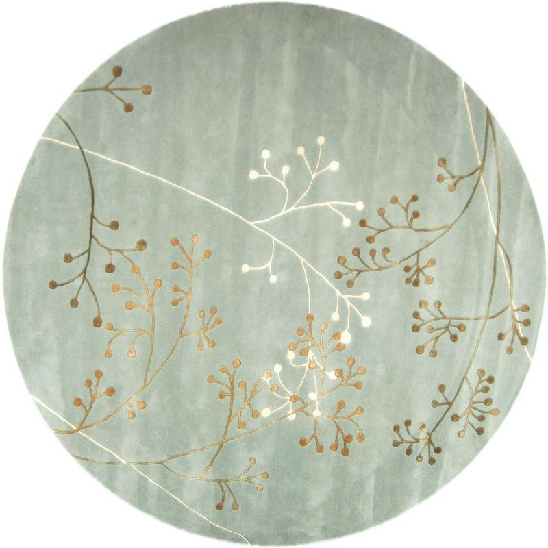 Soho SOH305 Hand Tufted Area Rug - Light Blue - 8' round - Safavieh.