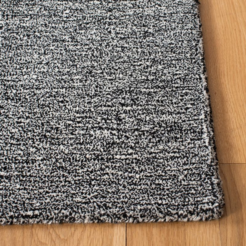 Metro MET867 Hand Tufted Indoor Area Rug - Black/Ivory - 4'x6' - Safavieh