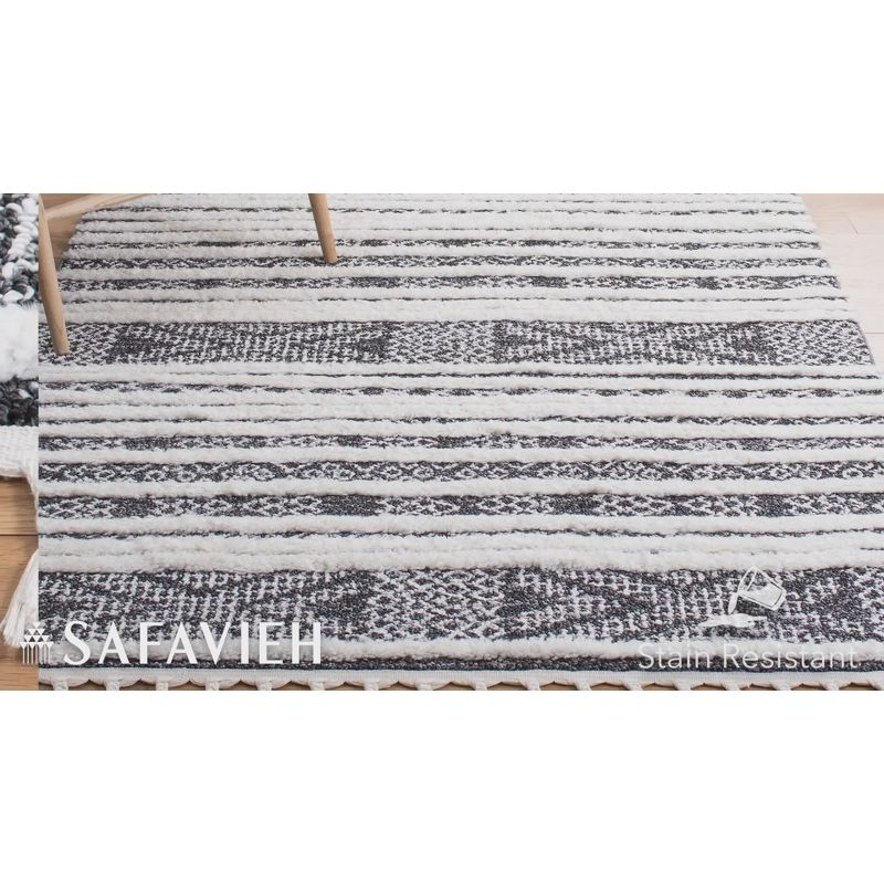 Moroccan Tassel Shag MTS632 Power Loomed Area Rug - Black/Ivory - 3'x5' - Safavieh.