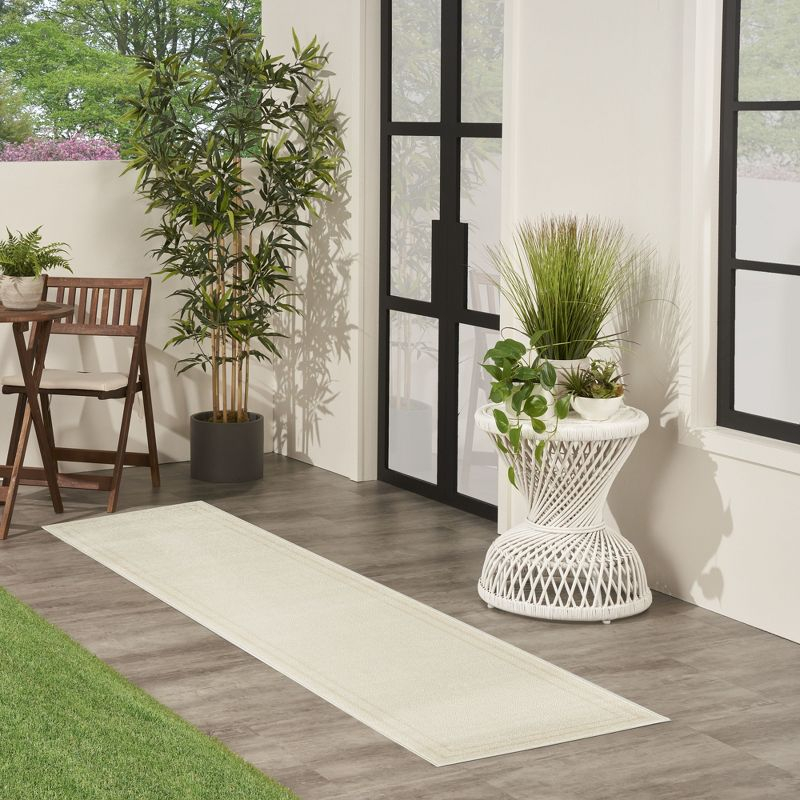 Nourison Essentials 2' x 6' Ivory Gold Contemporary Bordered Indoor/Outdoor Area Rug