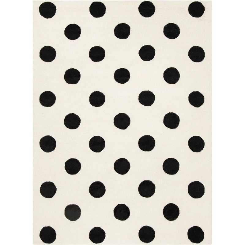 Safavieh Kids Polka Dots SFK904 Hand Tufted Indoor Area Rug - Ivory/Black - 5'x7' - Safavieh