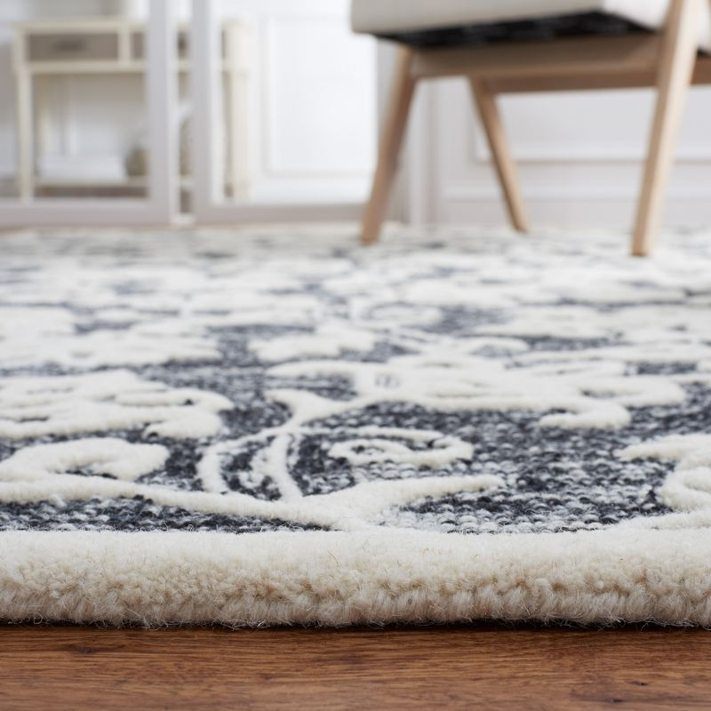 Metro MET853 Hand Tufted Indoor Area Rug - Black/Ivory - 6'x6' - Safavieh
