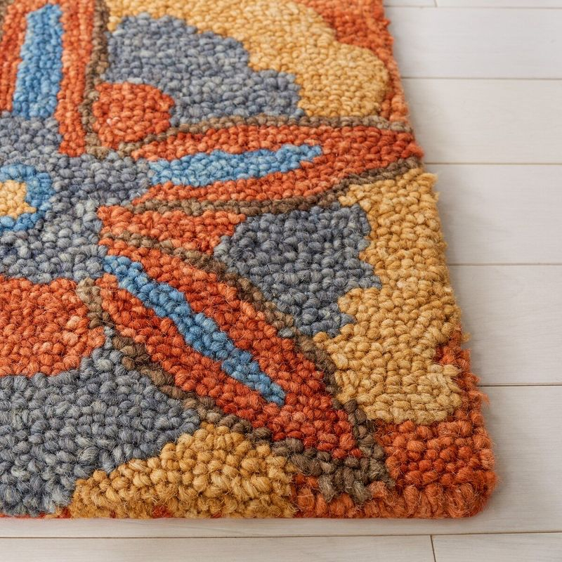 Blossom BLM175 Hand Tufted Area Rug - Rust/Blue - 5'x8' - Safavieh..