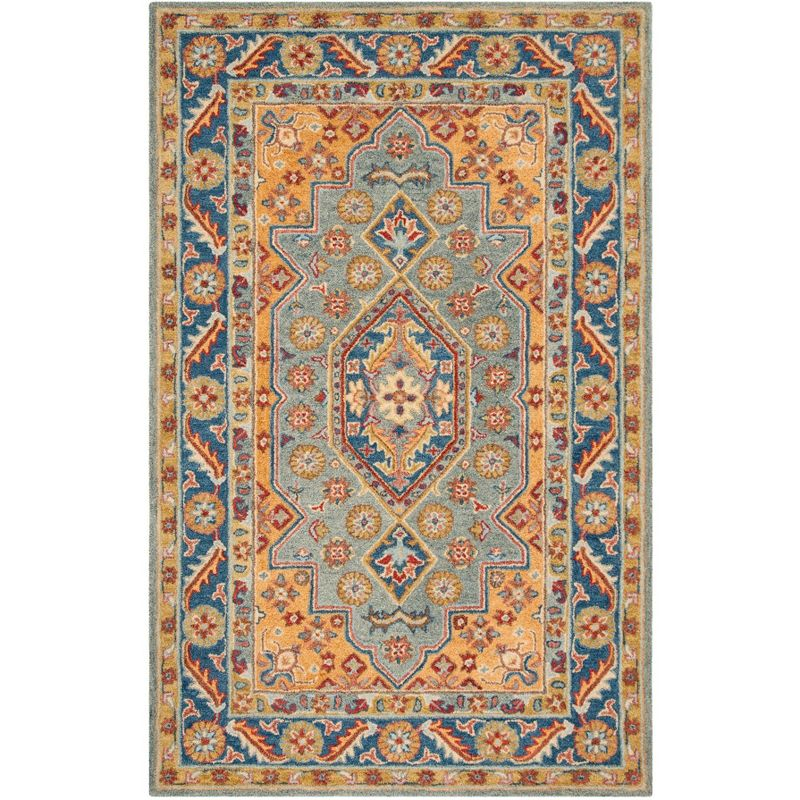 Antiquity AT504 Hand Tufted Area Rug - Blue/Gold - 4'x6' - Safavieh.