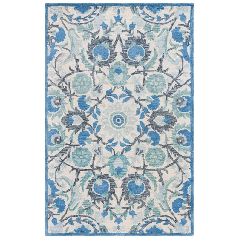 Antiquity AT59 Hand Tufted Area Rug - Ivory/Blue - 5'x8' - Safavieh.