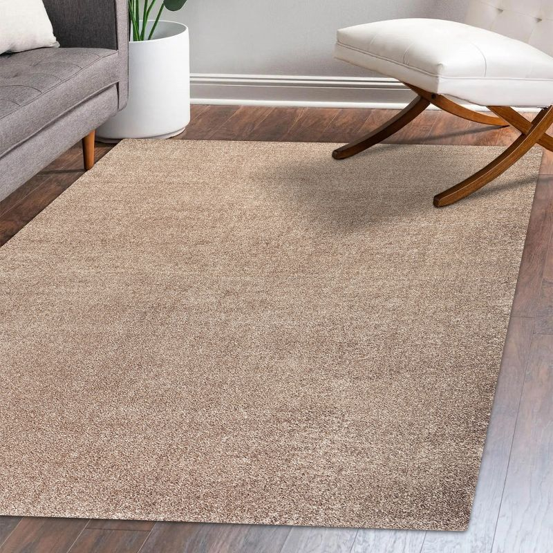8'x10' Haze Solid Low-Pile Area Rug, Beige - JONATHAN Y