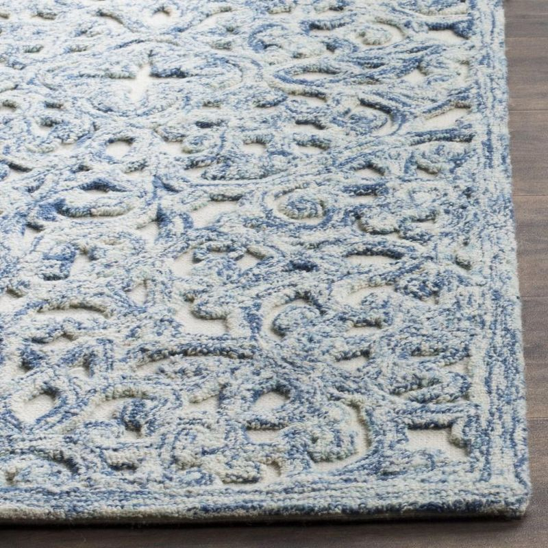 Trace TRC103 Hand Tufted Indoor Accent Rug - Blue/Ivory - 2'3"x4' - Safavieh.