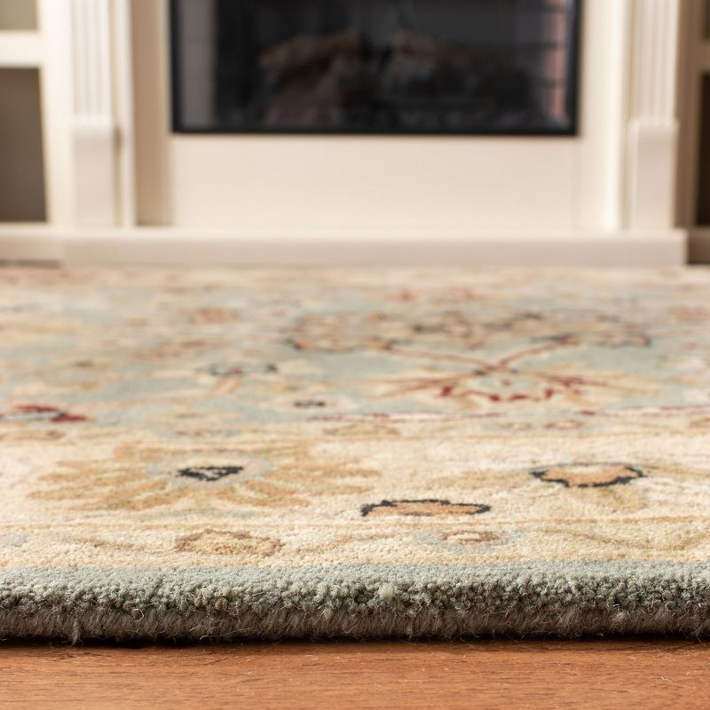 Antiquity AT249 Hand Tufted Area Rug - Light Blue/Ivory - 7'6"x9'6" Oval - Safavieh.