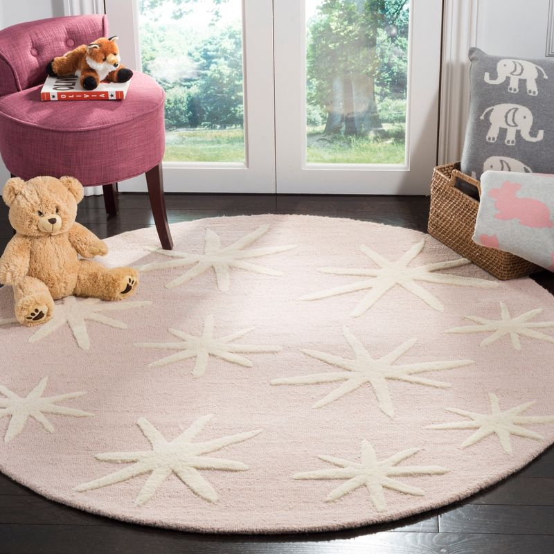 Safavieh Kids SFK908 Hand Tufted Area Rug - Pink/Ivory - 5' round - Safavieh.