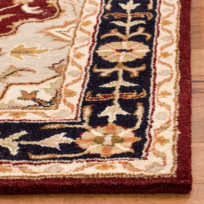 Heritage HG760 Hand Tufted Area Rug - Red/Black - 6'x9' - Safavieh.