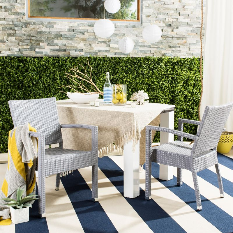 Kelda Stackable Arm Chair Indoor/Outdoor (Set Of 2) - PAT4004 - Grey - Safavieh