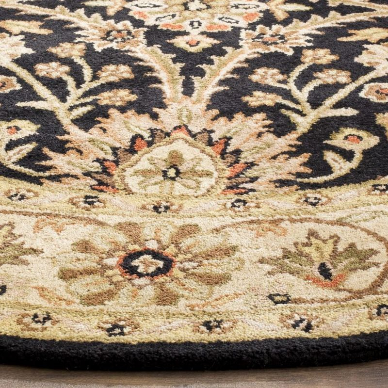 Antiquity AT249 Hand Tufted Area Rug - Black - 8' round - Safavieh.