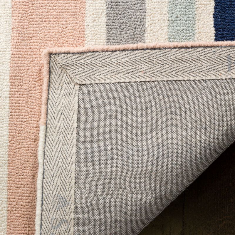 Safavieh Kids Multi Stripe SFK916 Hand Tufted Indoor Area Rug - Ivory/Multi - 8'x10' - Safavieh