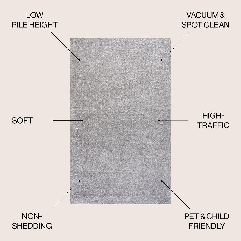 8'x10' Haze Solid Low-Pile Area Rug, Light Gray - JONATHAN Y