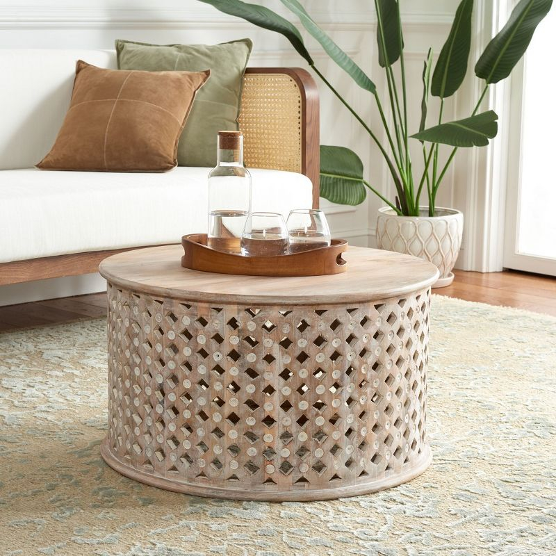 Kyrith Round Coffee Table - Burnt White - Safavieh