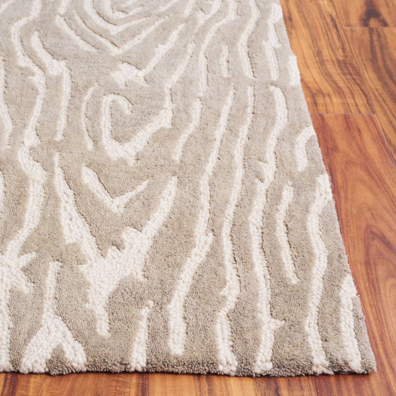 Ebony EBN550 Handmade Tufted Area Rug - Grey/Ivory - 6' X 9' - Safavieh