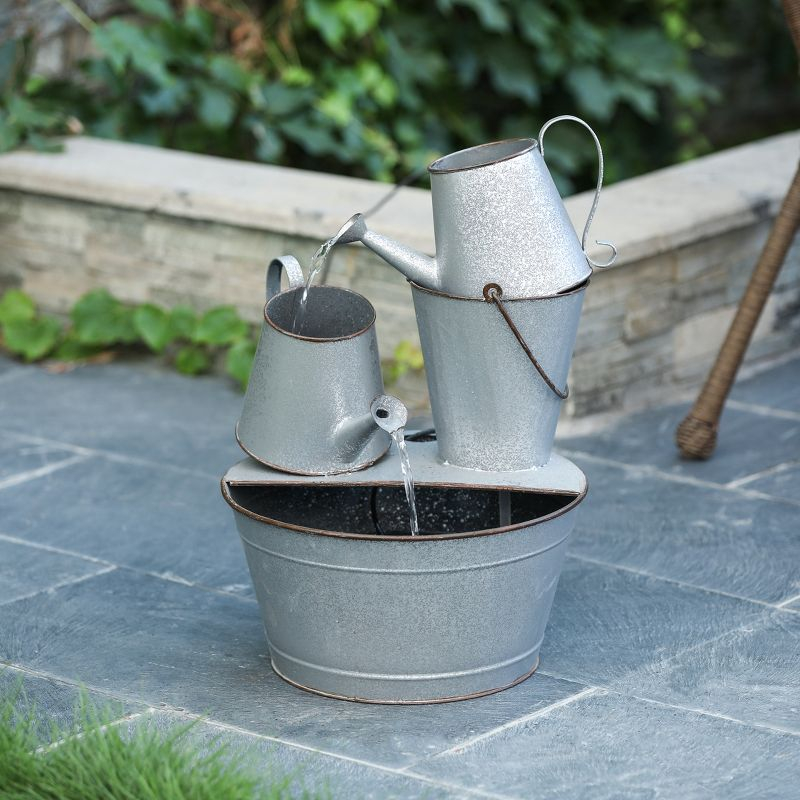 LuxenHome Farmhouse Rustic Metal Pitcher Outdoor Fountain Silver