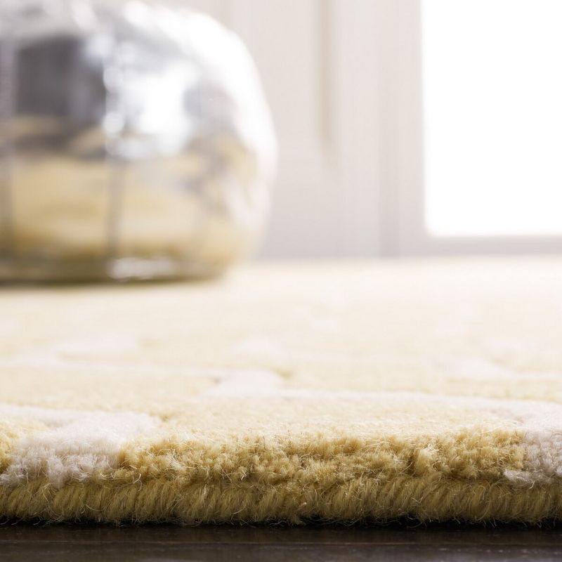 Chatham CHT736 Hand Tufted Area Rug Light Gold / Ivory 5' X 8' - Safavieh.