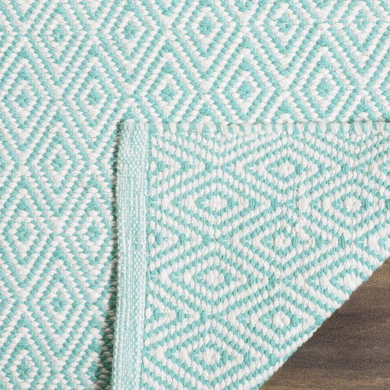 Montauk MTK515 Hand Woven Indoor Accent Rug - Ivory/Aqua - 2'6"x4' - Safavieh.