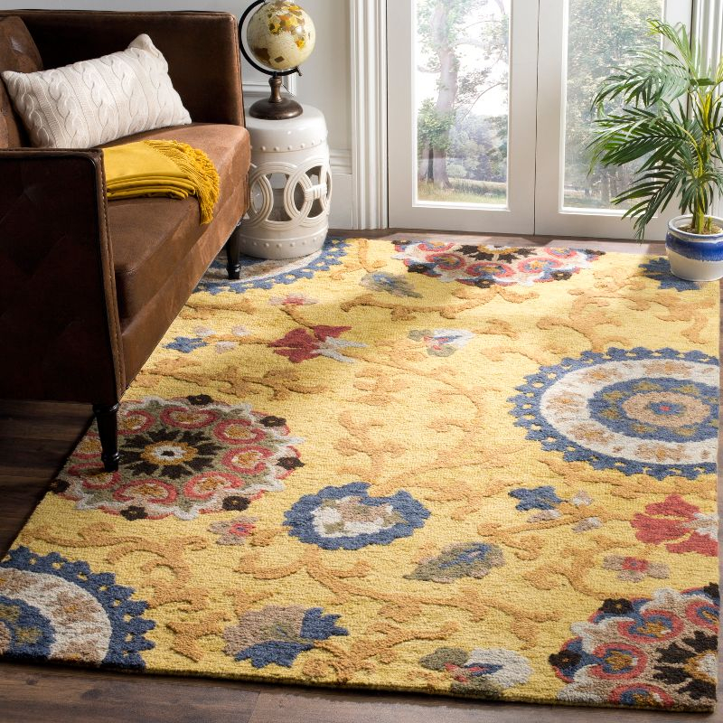 Blossom BLM401 Hand Tufted Area Rug - Gold/Multi - 5'x8' - Safavieh.