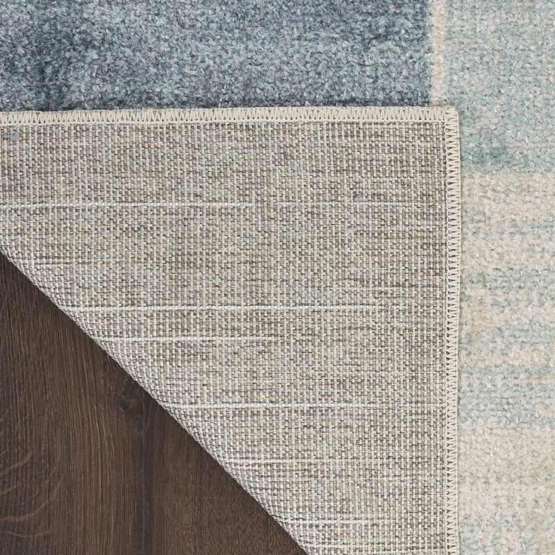 Nourison Astra Machine Washable Contemporary Color Block Indoor Rug Blue Ivory 5'3" x 7'