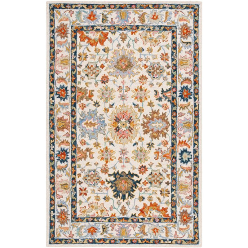 Aspen APN109 Handmade Tufted Area Rug - Ivory/Blue - 6' X 9' - Safavieh