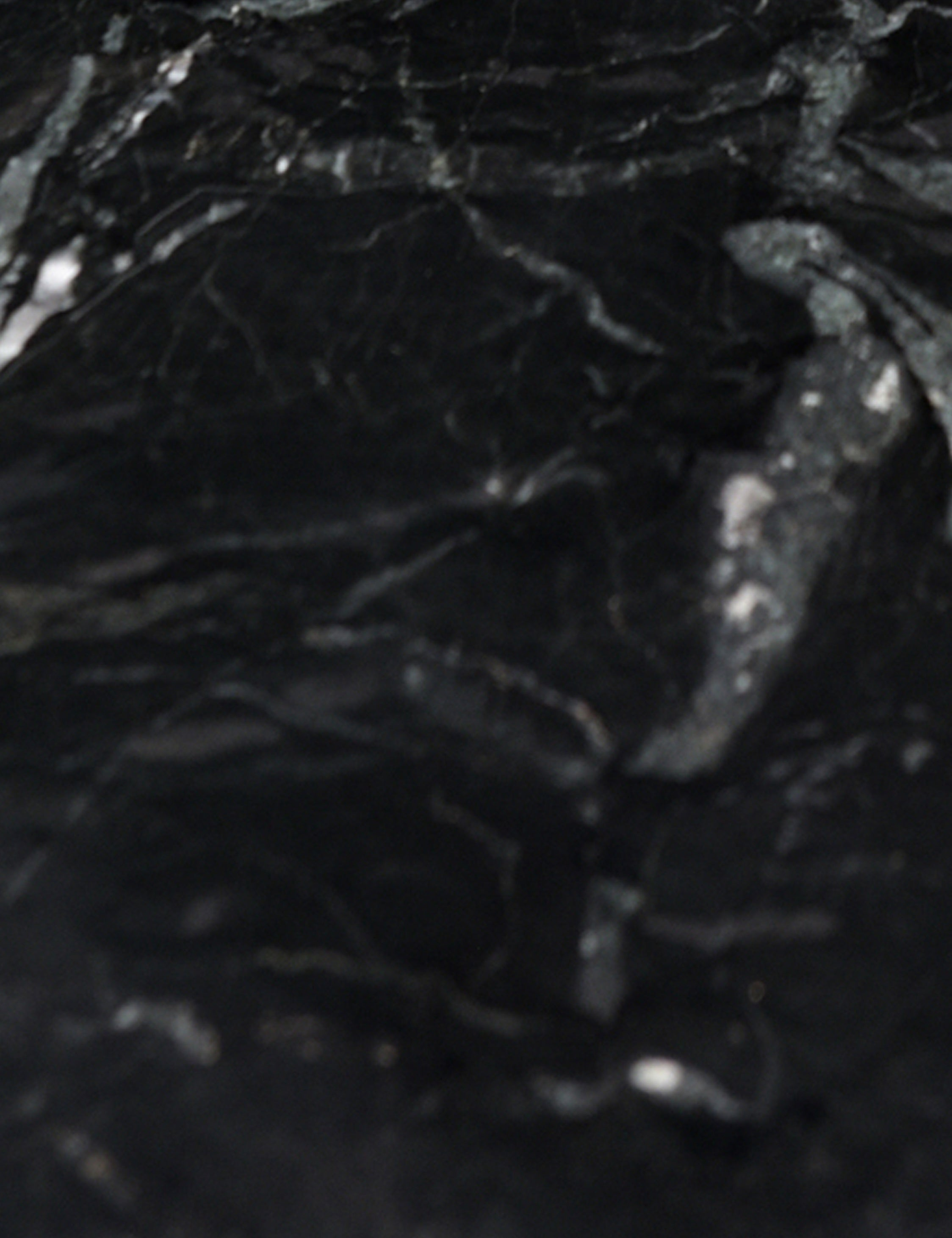 Huitink Round Dining Table - Black Marble